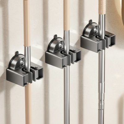 Accroche balai mural auto ajustable
